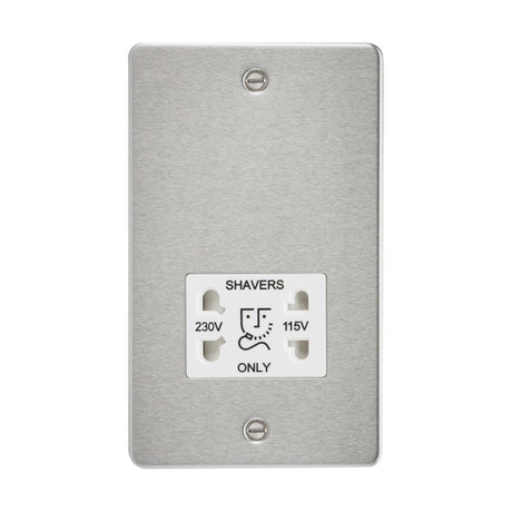 The 115/Dual Voltage Shaver Socket in brushed chrome, featuring a white insert and flat plate design, offers dual voltage options of 230V and 115V. Its ultra low profile is mounted on a simple metallic panel with visible screws at the top and bottom for enhanced functionality.