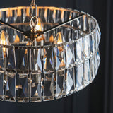 Bevmont 3 Light Pendant in nickel, close-up of cut faceted glass panels on a plated metal frame with visible chain and E14 bulbs.