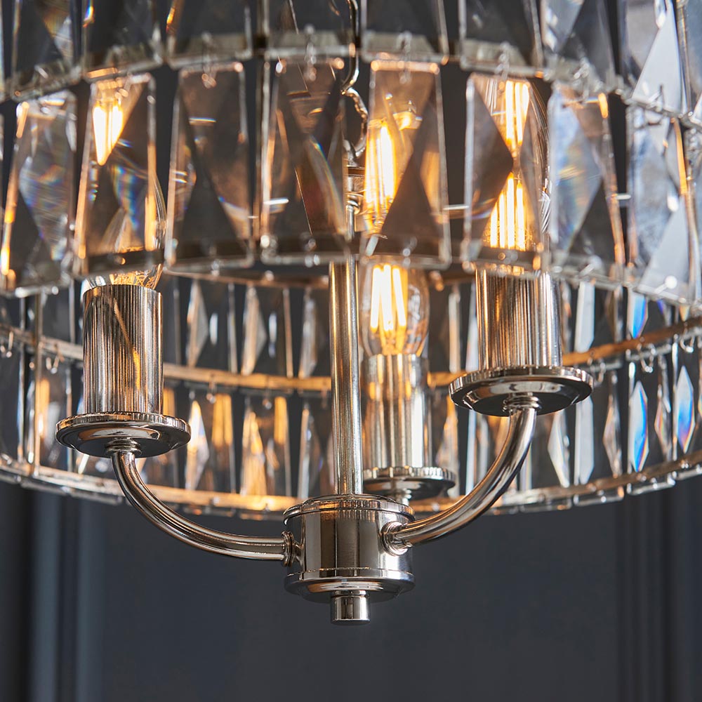 Bevmont 3 Light Pendant in nickel with faceted glass panels and three exposed E14 bulbs on curved metal arms.