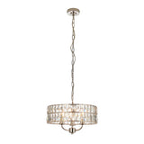 Bevmont 3-light pendant in nickel with a round drum shade of faceted crystal glass, suspended on a long chain, shown on a plain white background.