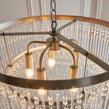 Close-up of the Endon Bramgrove 5 light pendant showing the antique brass frame, five E14 lamp holders and tiered clear glass droplets.