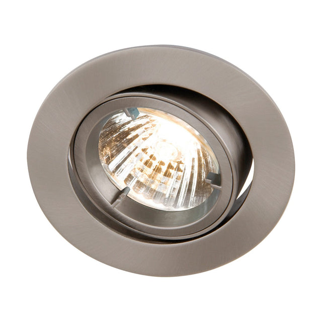 A close-up view of the GU10 Brushed Chrome Recessed Tilt Twist & Lock Downlight shows the LED compatible spotlight turned on, illuminating its reflective interior. The fixture is circular, with the partially visible bulb emitting a warm glow.