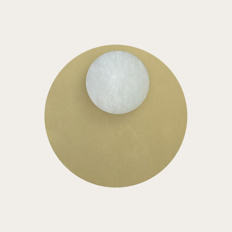 Royal Eclipse Alabaster Globe Wall Light with a 10cm natural stone sphere set on a round Matt Polished Brass disc, shown on a plain light background.