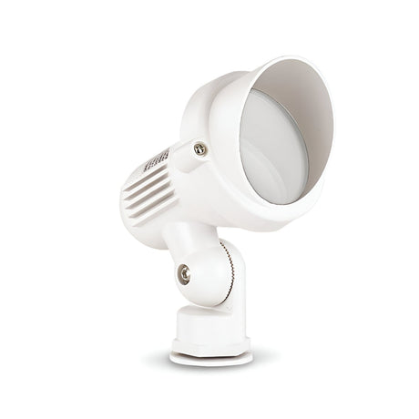 A Vespera Outside Small Single Spotlight in white, featuring an adjustable head and mounting base, is positioned slightly upward against a plain white background. This spotlight exhibits a modern design with ribbed detailing for heat dissipation and includes a circular lens cover. It boasts an IP65 rating, ensuring reliable weather resistance.