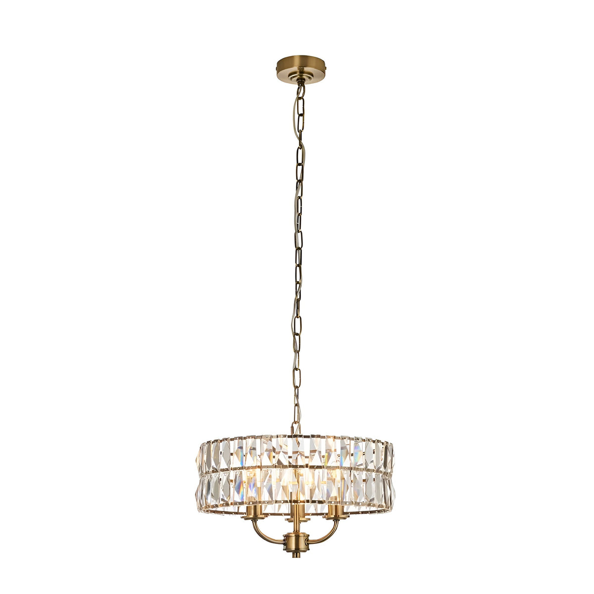Endon Bevmont 3 light pendant in brass with a drum shade of clear cut faceted glass on a height adjustable chain, shown on a white background.