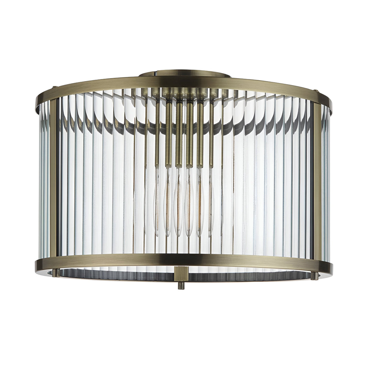 Rothbury Flush Ceiling Light in antique brass, a drum-shaped fixture with vertical glass rods around a central bulb, shown on a plain white background.