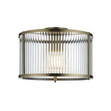 Rothbury Flush Ceiling Light in antique brass with a drum-shaped ribbed glass shade encasing a single E27 bulb, shown on a plain white background.