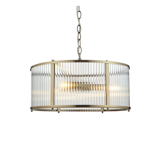Rothbury 3-light pendant with clear ribbed glass panels in an antique brass frame, hung from a chain, shown on a plain white background.