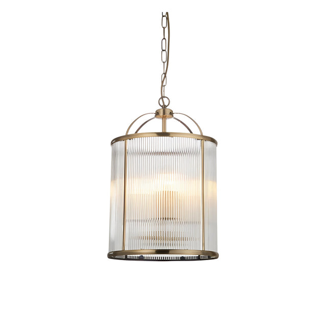 Endon Caldcombe pendant light with clear ribbed glass shade on an antique brass cylindrical frame, suspended from a chain against a white background.