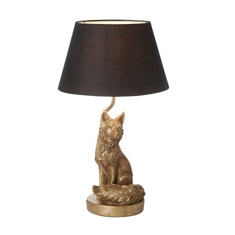 Endon Brambury table lamp with a vintage gold resin fox base and bushy tail on a round plinth, topped with a black tapered fabric shade.
