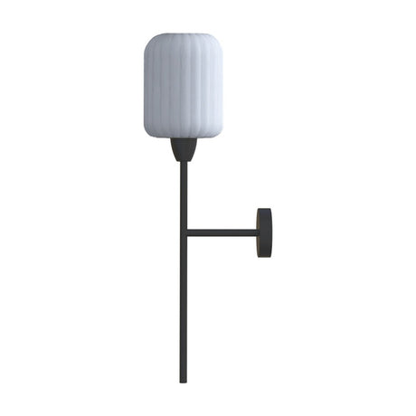 Whiteberry Lantern wall light with a ribbed opal glass cylinder shade on a slim matte black iron stem and round wall bracket, shown on a plain white background.