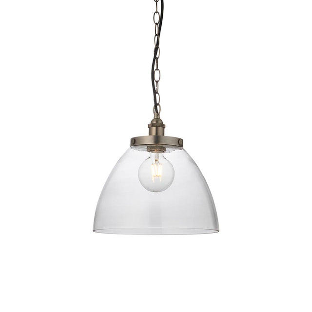 Wentworth Pendant in Silver, a single-light industrial fixture with a clear glass dome shade, brushed silver knurled lampholder, and black chain suspension.