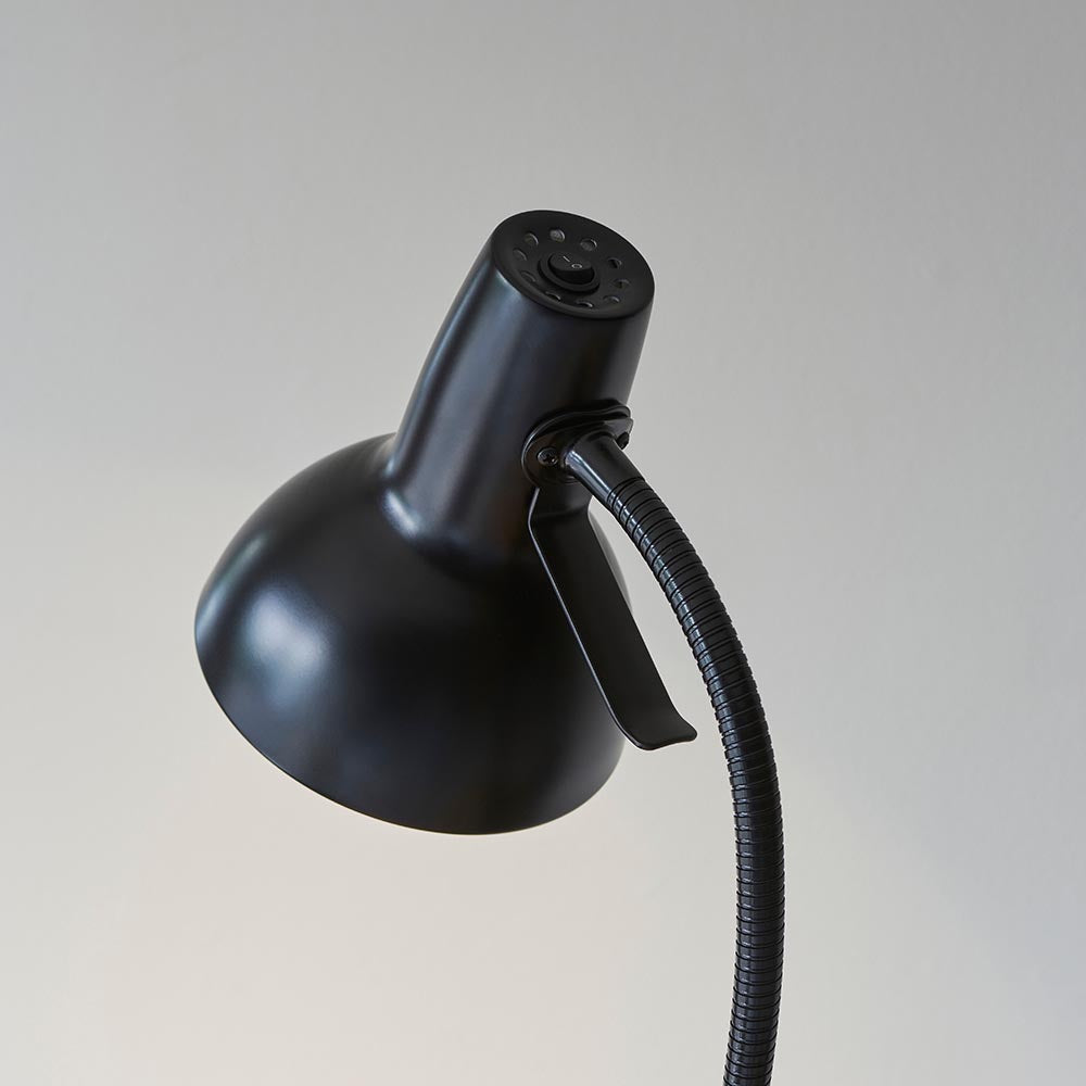 Endon Alderton floor lamp head in matt black, showing the adjustable dome shade, curved handle, rocker switch and flexible gooseneck stem on a light background.