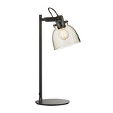 Endon Camden industrial task table lamp in matt black with knurled details, adjustable head and smoked grey tinted glass shade, on a plain background.