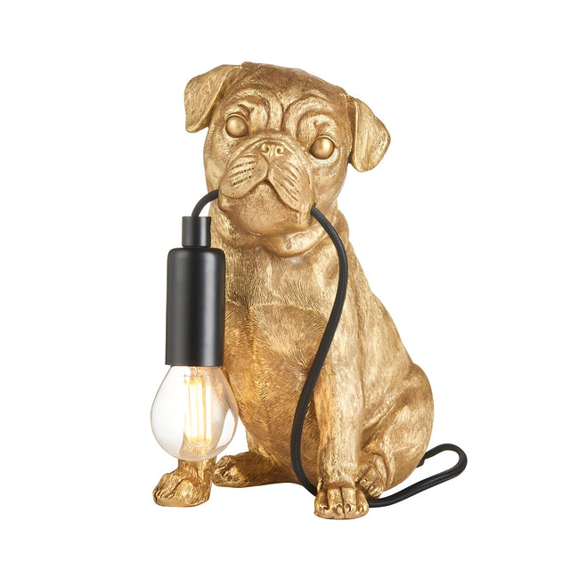 Endon Charthurst table lamp shaped as a gold resin pug figure holding a matt black E14 lamp holder with exposed filament bulb, on a white background.
