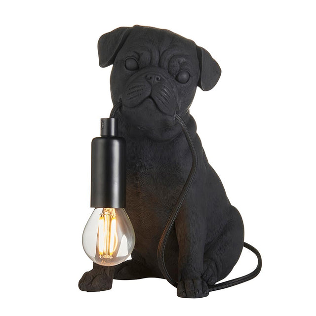 Endon Charthurst table lamp shaped as a matt black resin pug figure with an E14 filament bulb holder at its chest, on a plain white background.