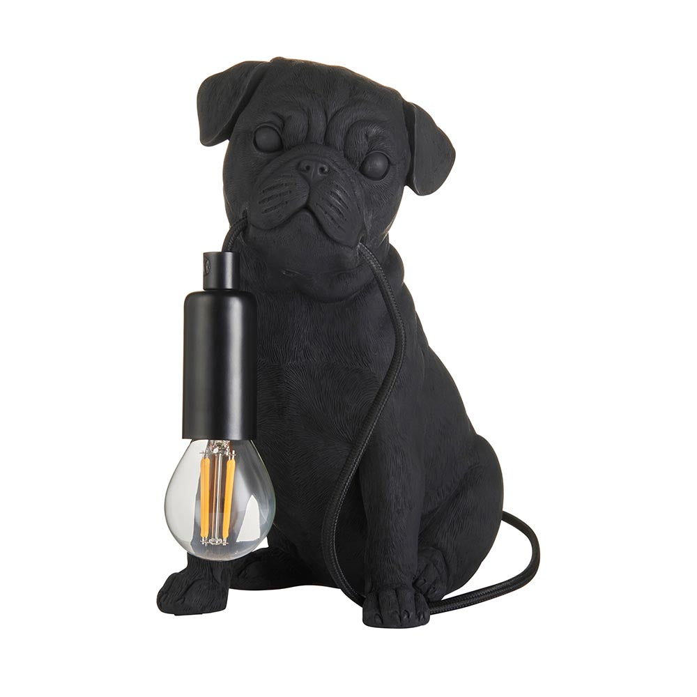 Endon Charthurst matt black resin table lamp shaped as a seated pug, with an E14 filament bulb in a black holder and fabric cable, on a white background.