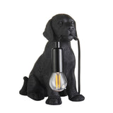 Endon Brockworth matt black resin Labrador puppy table lamp with E14 holder and visible filament bulb, on a plain white background.