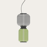 Greenberry LED Ribbed Glass Pendant Light featuring stacked grey and green blown-glass sections with a black collar and bands, hung on a black cable against a plain light background.