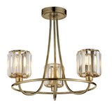 Endon Clementine 3 light semi-flush ceiling light in brass with three faceted glass shades and curved arms, shown on a white background.