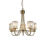 Endon Clementine 5 light pendant in brass with curved arms and clear cut faceted glass shades, suspended from a chain on a white background.