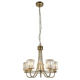 Endon Clementine 5 light pendant in brass with curved arms and clear cut faceted glass shades, suspended from a chain on a white background.
