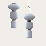 Whiteberries LED 3 Light Cluster Glass Pendant in Gold, two stacked ribbed white glass shade columns with gold collars and canopy, shown on a plain light background.