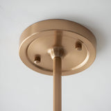 Close-up of the Endon Cliffleigh pendant's brushed aged brass ceiling canopy and stem, showing the rounded mounting plate and knurled fixing screws.