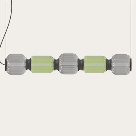 Greenberry LED 5 Light Ribbed Glass Linear Pendant Light in grey and green, with black collars joining the fluted glass shades on a plain light background.