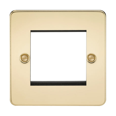 A 2 Gang Modular Faceplate in polished brass with a sleek and reflective finish, featuring a flat plate design. This gold-colored faceplate includes two screws and has a rectangular cutout for accommodating switches or outlets.