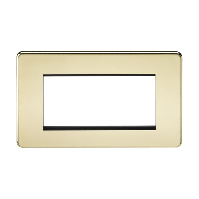 The 4 Gang Modular Faceplate in Polished Brass offers a stylish, seamless appearance with its rectangular design and central rectangular cutout, compatible with multiple switches or outlets. Its smooth, glossy finish enhances the screwless design.