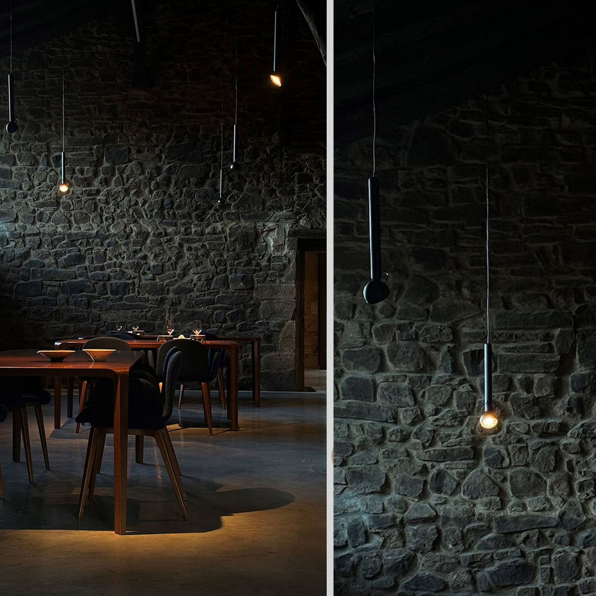 Berry S Aluminium LED pendant light with slim black tube and angled domed head, shown with another pendant against a stone wall in a dining room.