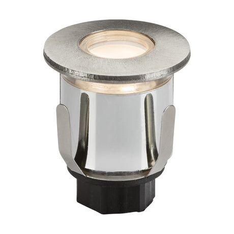 The Outdoor 0.6W 3000K LED Mini Ground Light With 3 Heads features a circular frame with a frosted lens and a metallic recessed design. It boasts a brushed chrome cylindrical body, making it ideal for outdoor use to softly illuminate pathways or stairs with its warm white glow.