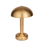 Endon Ashfield portable LED table lamp with a domed shade, fluted stem and round base in a brushed brass finish, shown on a plain white background.