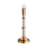 Endon Carlwood LED table lamp in brushed aged brass with clear acrylic column detail and exposed globe bulb, on a plain white background.