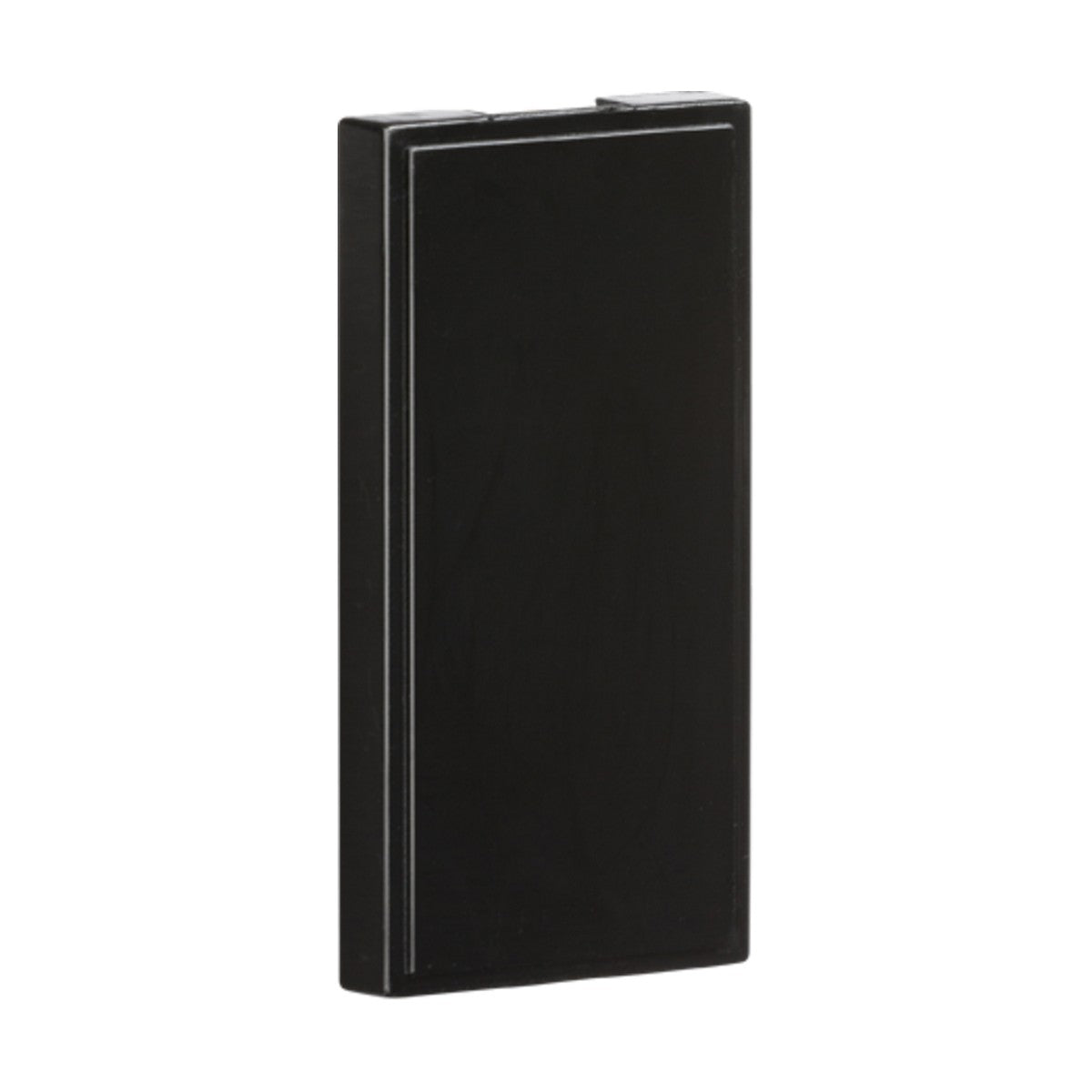 A black, rectangular device from the PACK OF 10 - Half Blanking Modules (25 X 50mm) collection, featuring a sleek and minimalist design with an ABS construction. There are no visible buttons or logos, and it is angled slightly to highlight its slim profile against a white background.