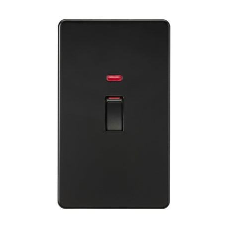 A matte black 45A double pole switch, part of a screwless design, features a subtle neon indicator light above the toggle. This switch, currently in the off position, is mounted on a sleek black rectangular faceplate reminiscent of those used in sophisticated cooker control units.