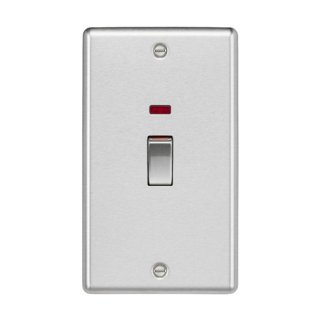 The 45A DP Switch Neon in a brushed chrome finish boasts a rounded edge design, featuring a small red indicator light above the switch on its rectangular plate. This double pole model provides both elegance and practicality, perfect for wall mounting.