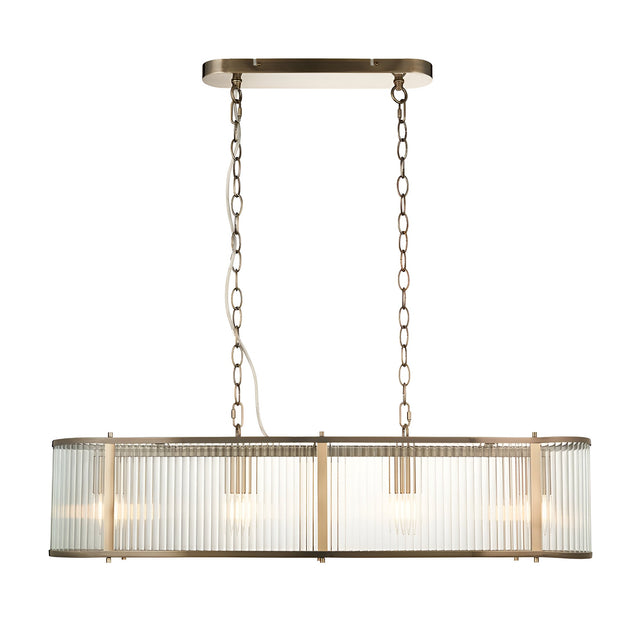 Rothbury 4-light linear pendant in antique brass with clear ribbed glass shades, hung by twin chains from a rectangular ceiling plate.