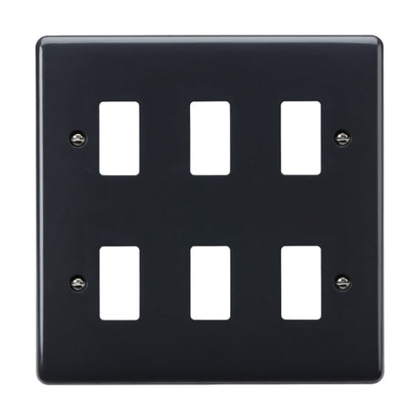 This sleek 6 Gang Grid Faceplate [Part M Compliant] is a black light switch cover with a glossy finish and anti-microbial properties. It features two horizontal rows of three rectangular openings, secured by four metal screws—one in each corner, enhancing aesthetics while providing safety as part of modern wiring accessories.