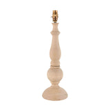 Endon Brenhurst table lamp base in hand-turned natural solid wood with a turned baluster profile and switched brass B22 lamp holder, on a white background.
