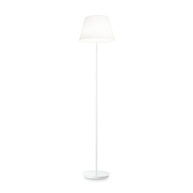 The Heaven Floor Lamp - White, showcasing a minimalist design, is characterized by a slender stand and an expansive conical lampshade made from white blown glass. This sophisticated piece emits ambient light against a clean, white backdrop, making it an ideal addition to any contemporary setting.