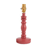 Endon Aldworth turned wood spindle table lamp in satin pink with a brass B22 switched lampholder, shown without a shade on a plain white background.