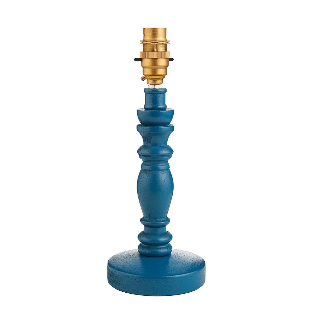 Endon Aldworth table lamp with a turned marlin blue wooden spindle base and brass B22 switched lampholder, shown without a shade on a plain white background.