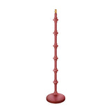 Endon Bevbury floor lamp with a hand-turned wooden spindle base in satin pink clay and a brass B22 lamp holder, shown on a plain white background.