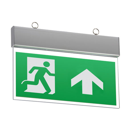 A Ceiling Mounted LED Emergency Exit Sign, featuring a white figure running toward a door and a prominent upward-facing arrow, is mounted on the wall. It showcases an interchangeable legend design within its sleek metallic frame and includes two loops for hanging.