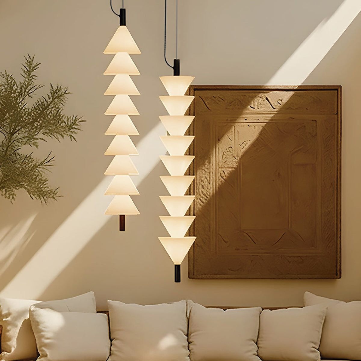 Boga Vertical Down LED Cone Glass Linear Pendant in Matt Black, stacked white glass cones on a black rod, shown beside a similar pendant in a living room with sofa and framed wall art.