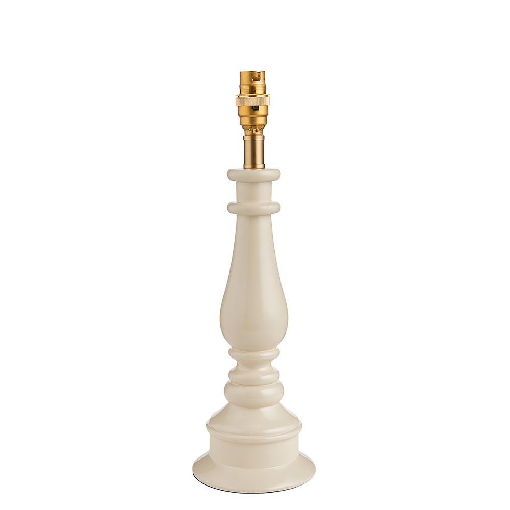 Carlworth table lamp base in white resin with turned spindle design and brass B22 bayonet lamp holder, shown on a plain white background.