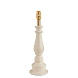 Carlworth table lamp base in white resin with turned spindle design and brass B22 bayonet lamp holder, shown on a plain white background.