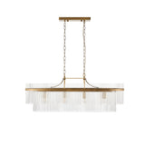 Beaumont 4 Light Linear Pendant in antique brass, with clear glass rods lining a long bar suspended from twin chains, shown on a plain white background.